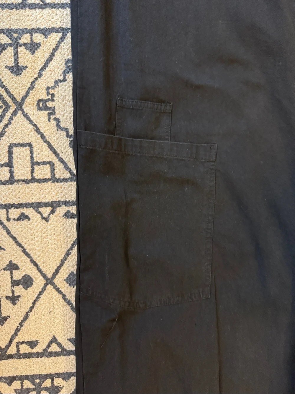 Sleeveless Black Jumpsuit with Front Buttons and utility pockets - Picture 11 of 12
